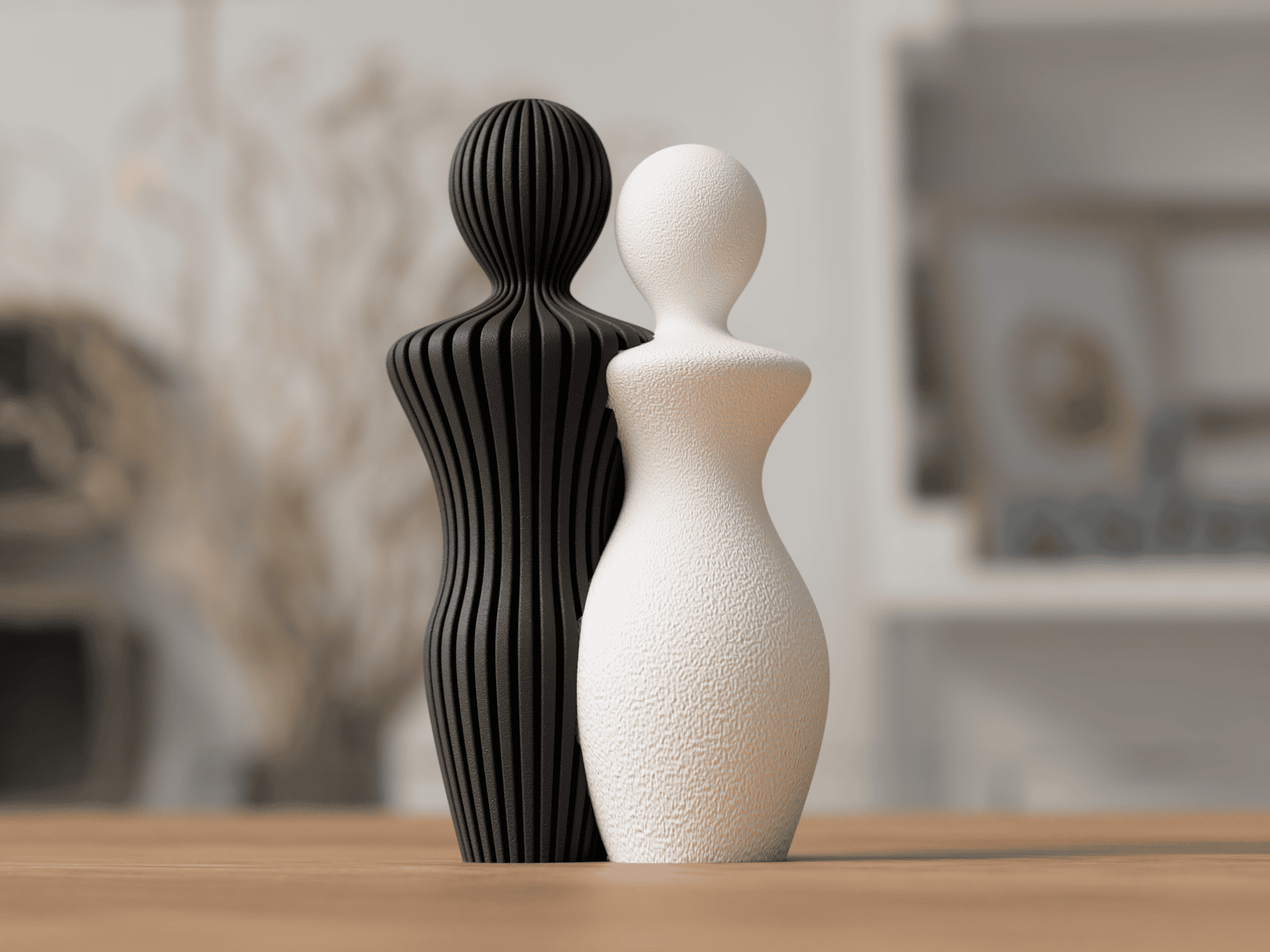 Pärchen-Skulptur Schwarz & Weiß – zwei individuell wählbare Figuren